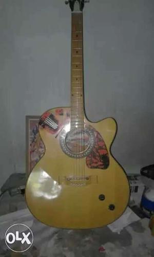 Brown Cutaway Guitar