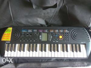 Casio sa77 keyboard with adapter n cover