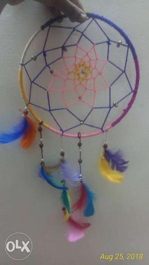 Multicoloured dream catcher. 13 inch length and
