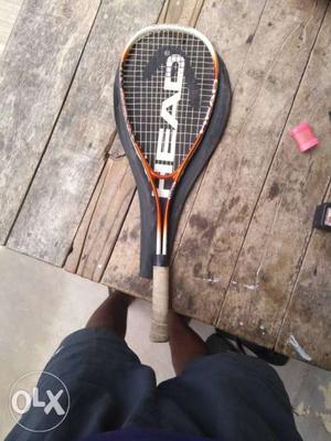 Orange And White Head Tennis Racket And Black Case