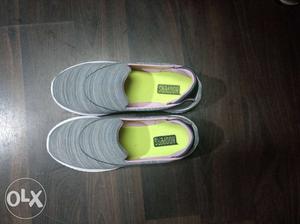 Pair Of Gray-and-pink Slip On Shoes