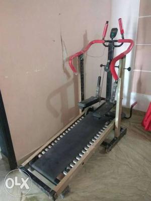 Red, Grey, And Black Treadmill