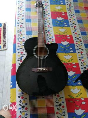 Rocks guitar with capo and cover used for very