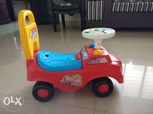 Toddler's Red And Blue Plastic Cart