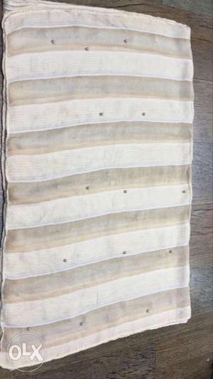 White And Gray Striped Textile