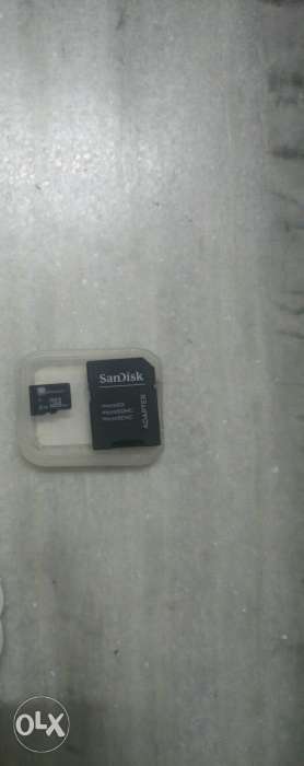 4 gb memory card with its adapter in excellent