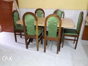 6 seater dining table with chairs.it is made by