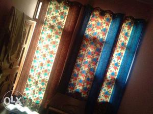 Blue And Multicolored Floral Grommet Window Curtain