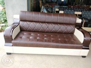 Brown Leather Tufted Sofa With Ottoman