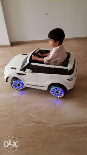 Kids in driving toy car - Range rover with 2