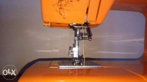 Orange Electric Sewing Machine