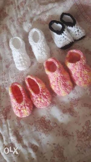 Pair Of Pink Knitted Shoes