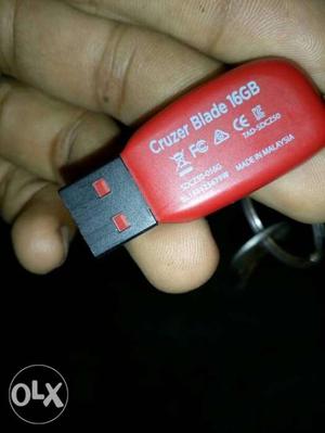 Red And Black SanDisk Cruzer Blade Thumb Drive