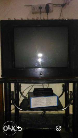 Tip_top_condition_tv_with_tv_stand_i_need_money