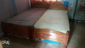 Two 3×6cots woodencots with mattresses