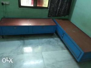 Two single wooden beds 2.5 ft by 6 ft size.
