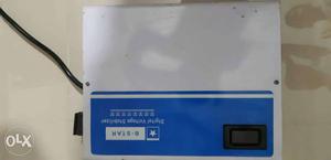 White And Blue Digital Voltage Stabilizer