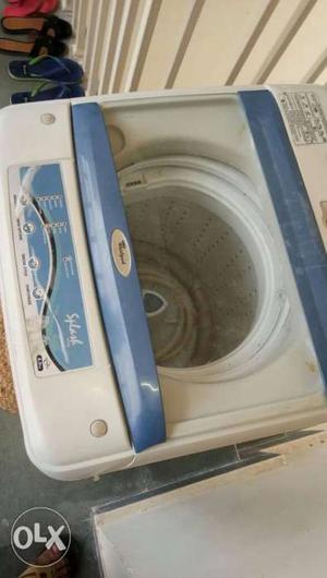 White And Blue Whirlpool Top-load Washing Machine