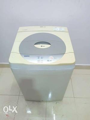 White LG Top-load Clothes Washer