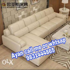 White Leather Sectional Couch With Ottoman