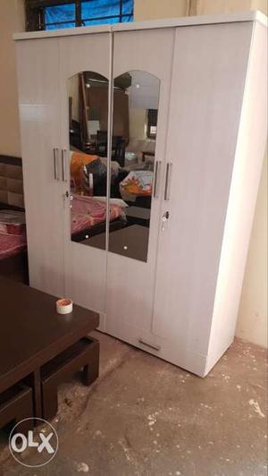 White Wooden 4-door Wardrobe With Mirror