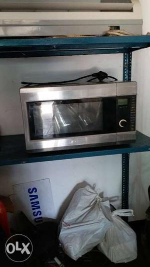 LG Black And Gray Microwave Oven. Running Condition.