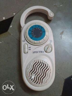 Oval White And Blue Spectra Wireless Device