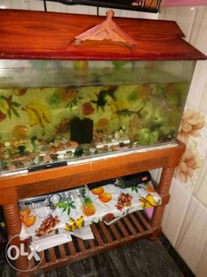 The content includes fish tank and the wooden