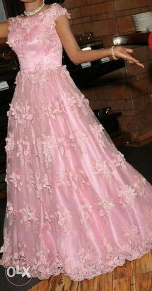 A light baby pink new brand gown. Manish Malhotra