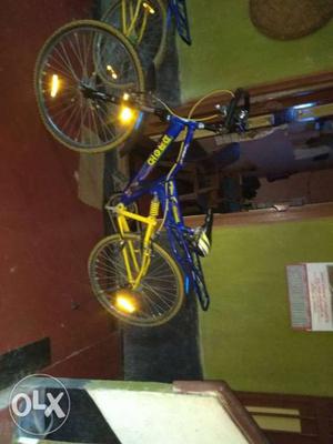 Blue And Yellow Full-suspension Bike