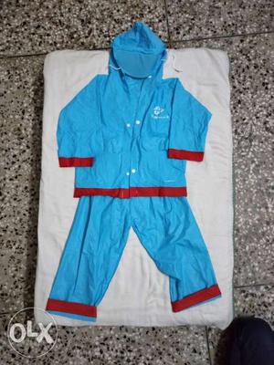 Blue Rain Jacket And Pants
