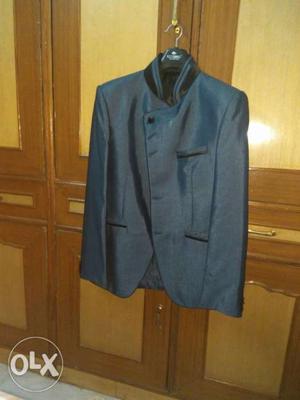 Brand new suit size L. waist size 34