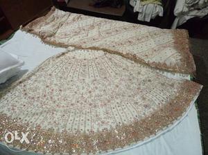 Cream wedding lehnga set with embroidery