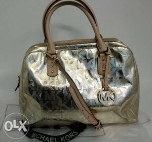 Gently used original Michael Kors bag in a subtle