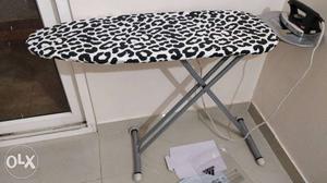 Ironing table. Used for 2 months.