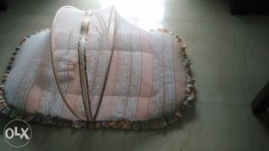 Jumbo baby bed with mosquito net