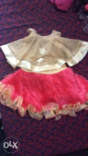 New 6-12 months frock unused, looks bright than pic exact