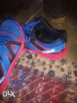 Pair Of Blue-and-red Nike Basketball Shoes