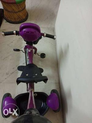 Purple And Black Trike With Training Wheels
