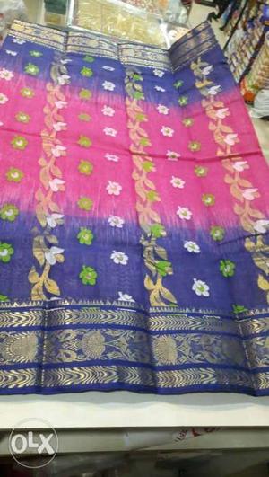 Purple, Yellow, And Green Floral Textile