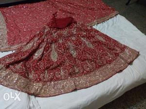 Red wedding lehnga set with embroidery