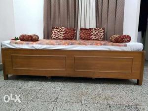 Single Brown Wooden Bed Frame With White Mattress