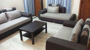 Two Black And Gray Suede Sofa Chairs