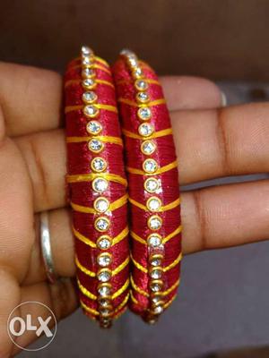 Two Red And Orange Silk Thread Bangles