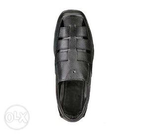 Unpaired Black Leather Shoe