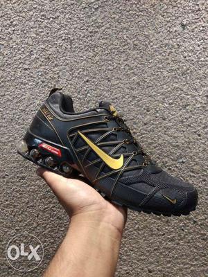 Unpaired Black Nike Athletic Shoe