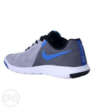 Unpaired Blue And Black Nike Running Shoe