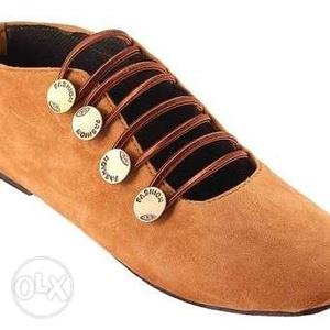 Unpaired Brown Suede Shoe