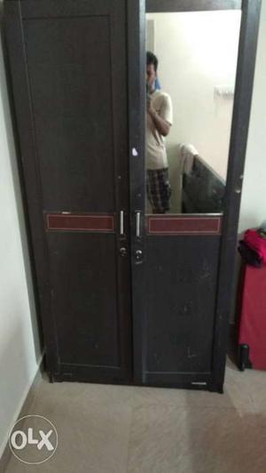 Wardrobe in good condition with mirror close to 6