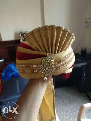 Golden and red pagdi for the groom. Brand new